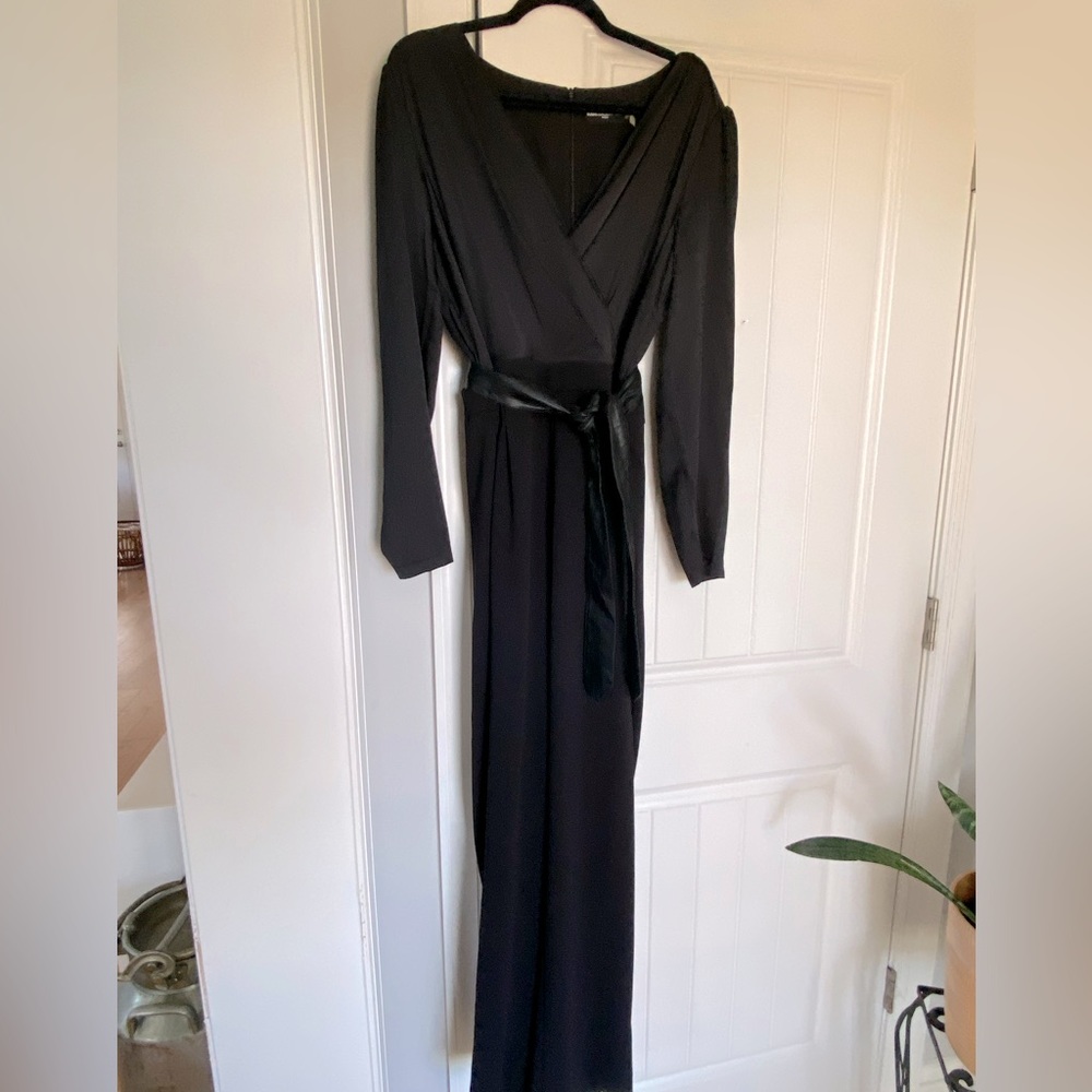 Black Karl Lagerfeld jumpsuit with leather belt and detailing